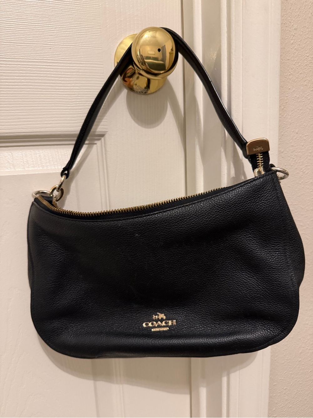 Coach Black Leather Shoulder Bag with Gold Hardware Accent